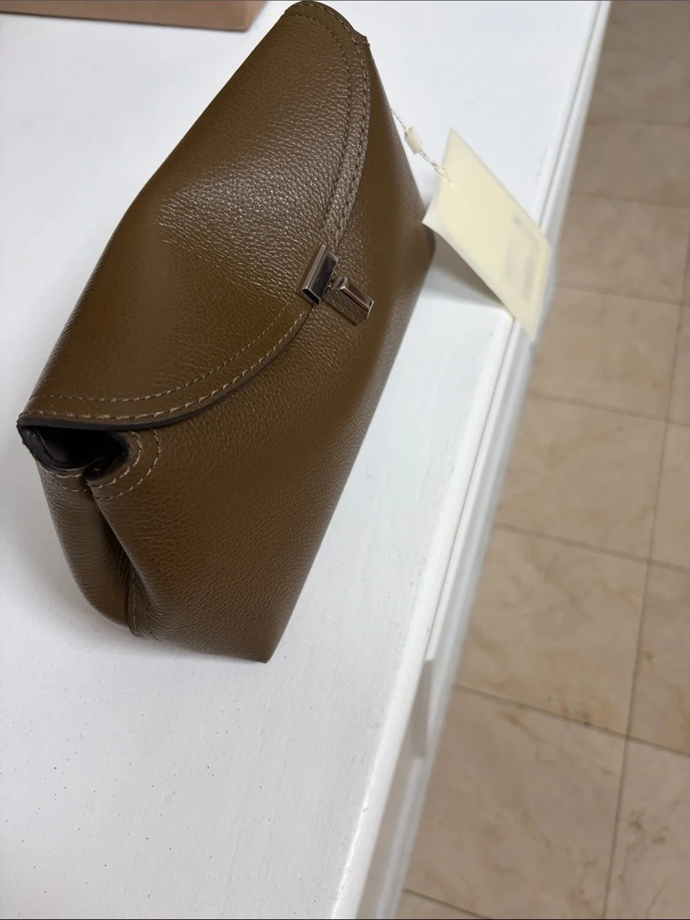 Toteme Dark Taupe  Leather Pebbled Clutch with Silver-Tone T Closure .